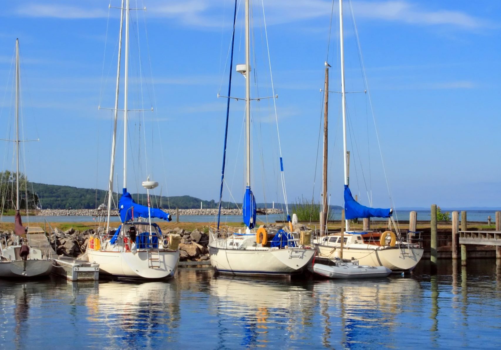 Sailboats at rest on a summer afternoon in Michigan